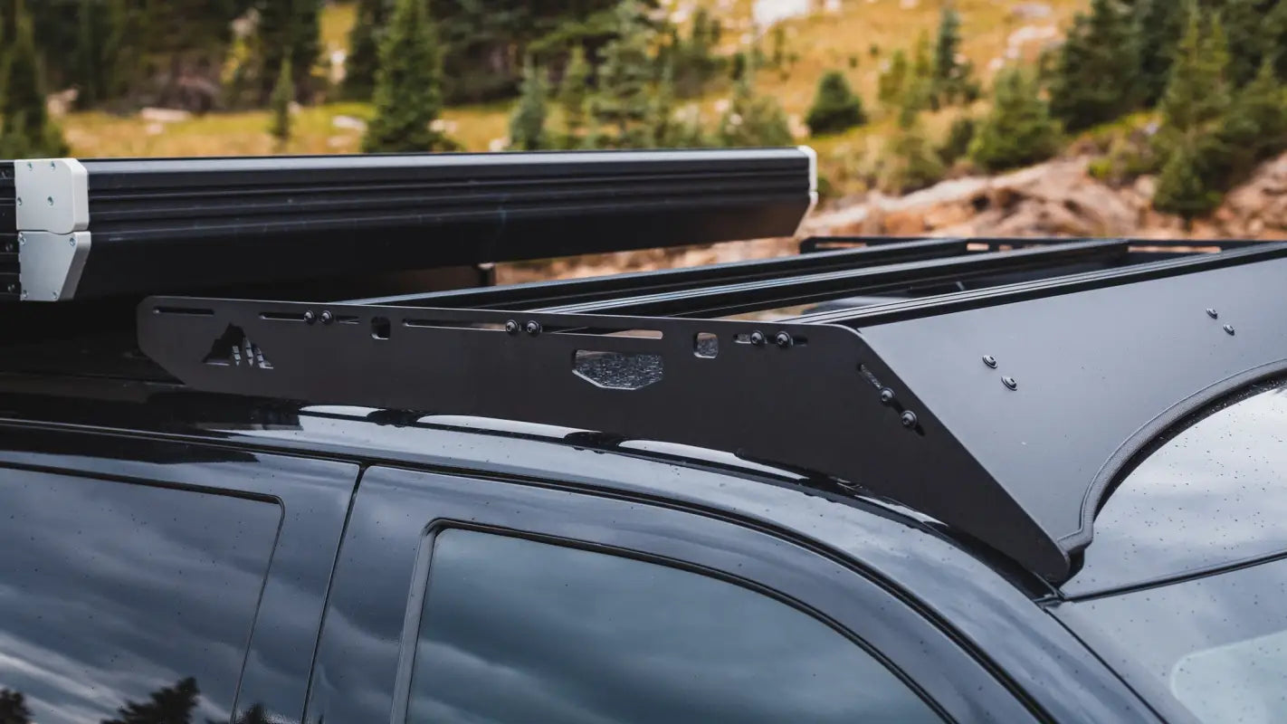 The Cub Roof Rack on a Toyota Tundra, showing multiple crossbars and aerodynamic fairing for optimized storage and performance.
