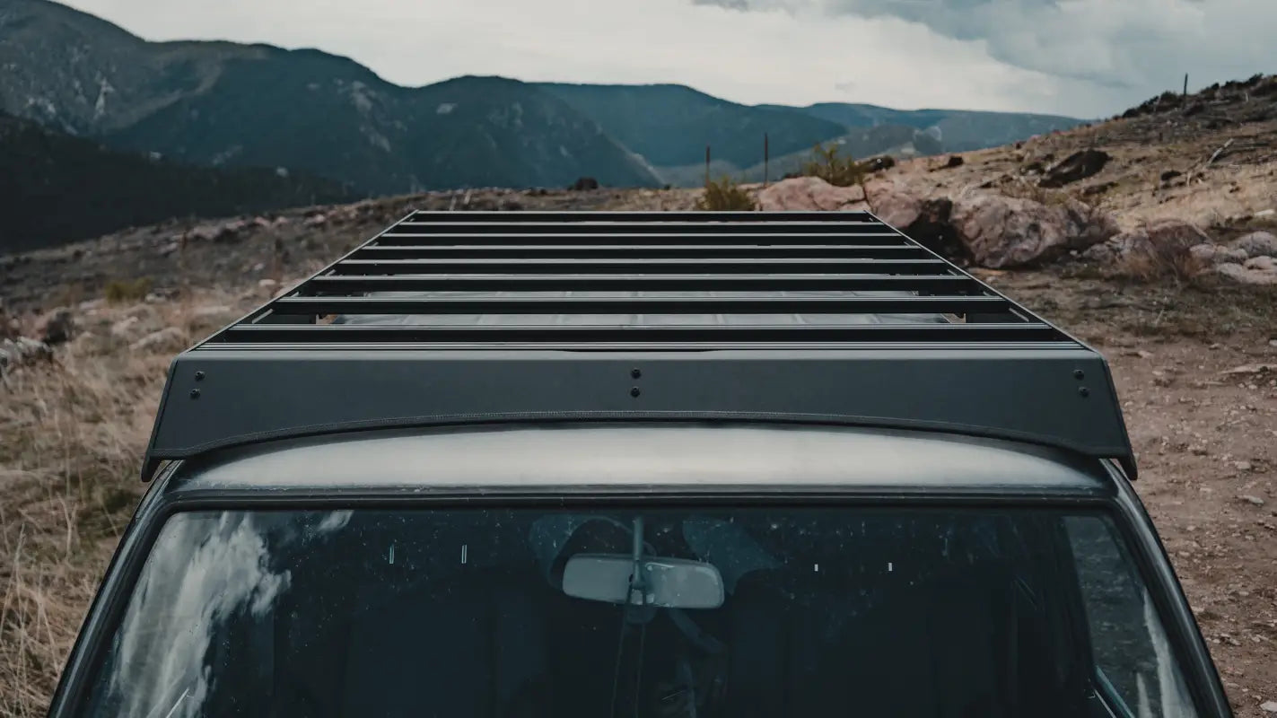 Top-down view of the 60 Series Land Cruiser roof rack, featuring aircraft-grade aluminum construction and a spacious cargo platform.