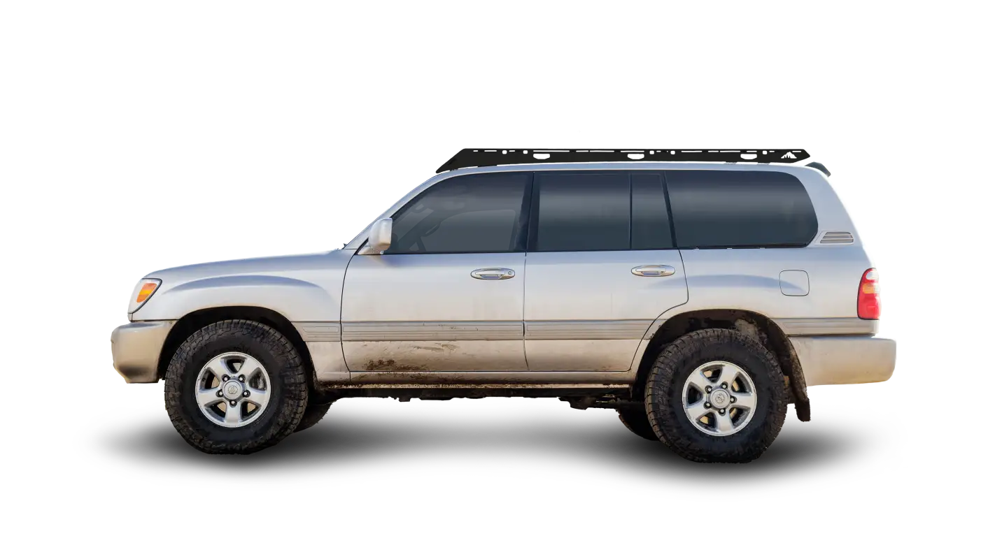 Toyota Land Cruiser LC100 with The Oxford Roof Rack installed, showcasing a full-length aluminum design for secure cargo storage.