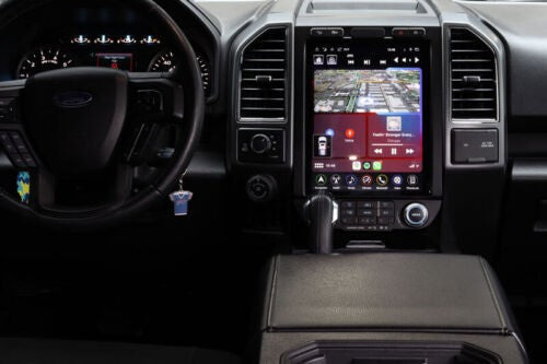 LinksWell GEN 6 T-Style 12.1-inch head unit installed in a Ford F-Series dashboard, showcasing navigation and multimedia interface.