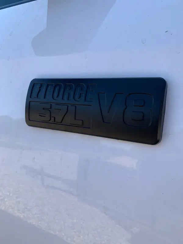 Black engine badge for Tundra Overlays & Inserts, perfect for Tundra overlays and tailgate inserts