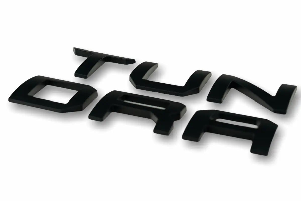 Black Tundra lettering with Tundra Overlays and Inserts, perfect for tundra tailgate insert