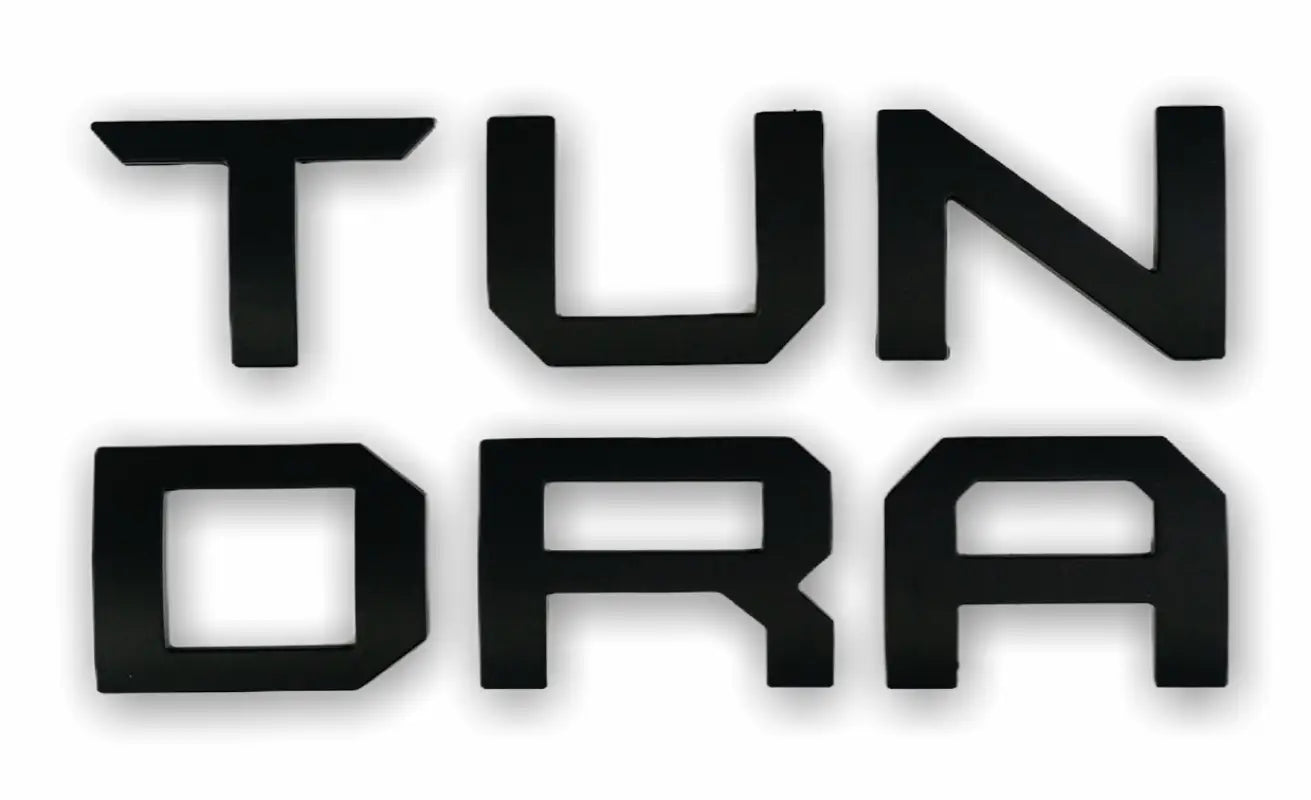 Black TUNDRA lettering on Tundra Overlays & Inserts showcasing tundra overlays and tailgate insert