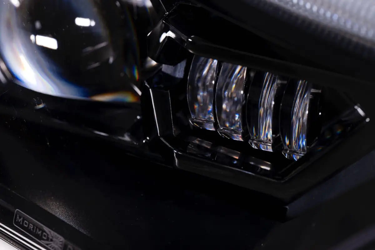 Automotive headlight assembly featuring Evo headlights with high beam and turn signals for 14-24 4Runner
