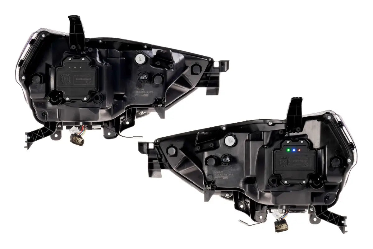 Two black XB Evo Headlights with high beam and turn signals for 14-24 Toyota 4Runner